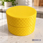 Closed yellow screw-top ampoule holder on a kitchen worktop.