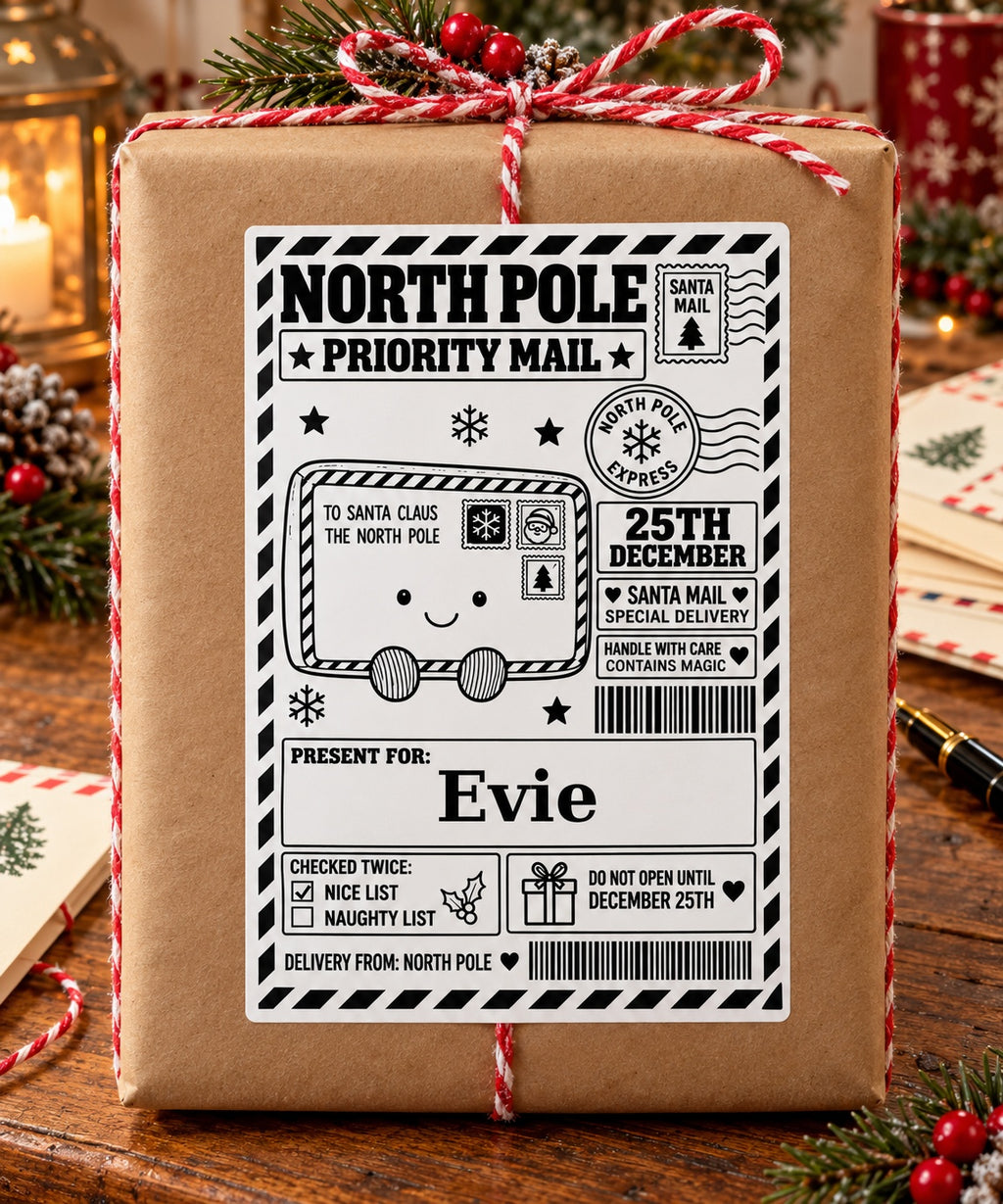 Letter to Santa North Pole sticker personalised with Evie, shown on a wrapped Christmas gift.