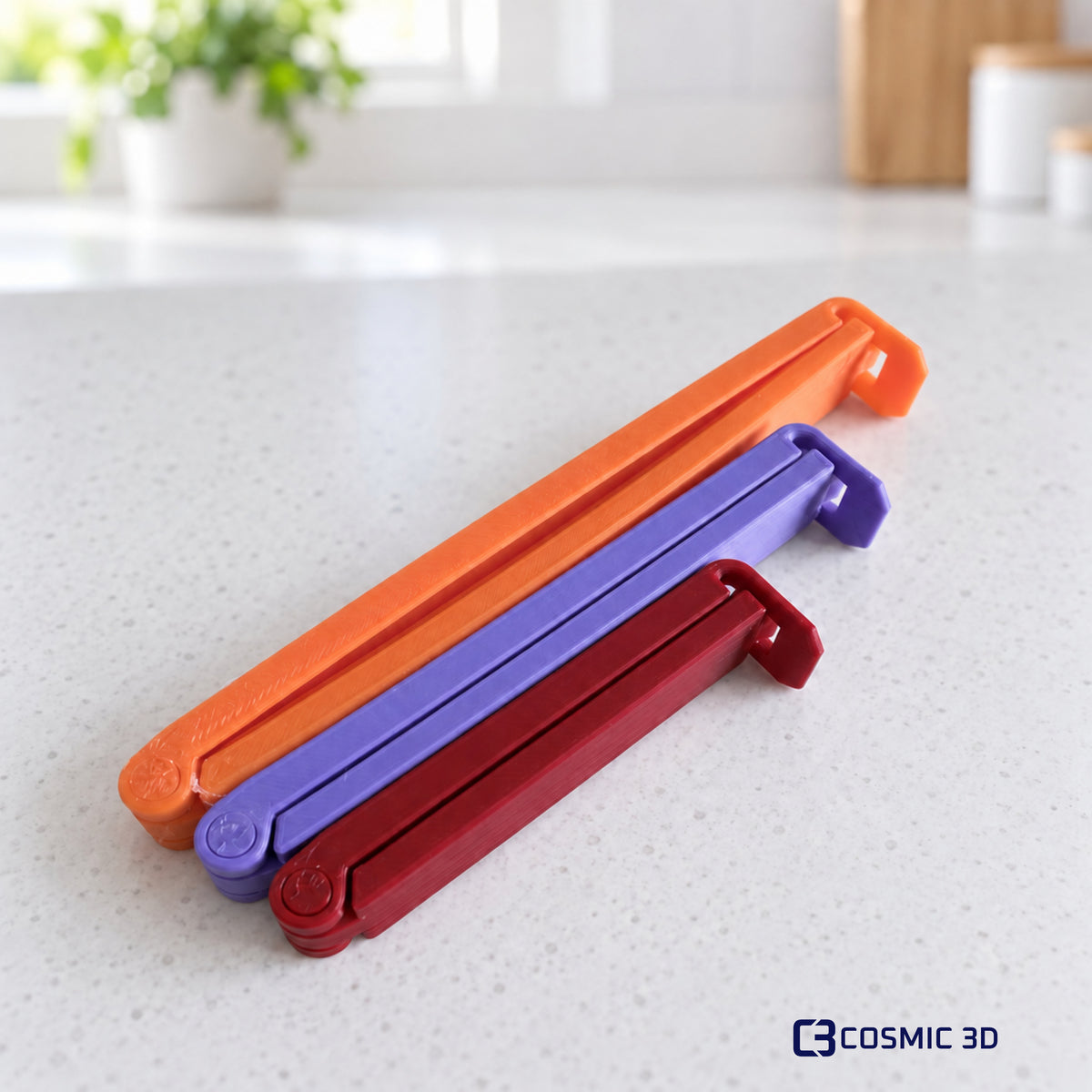 Reusable Kitchen Bag Clips – Pack of 3 by Cosmic 3D — Three-size clip pack, orange/purple/red